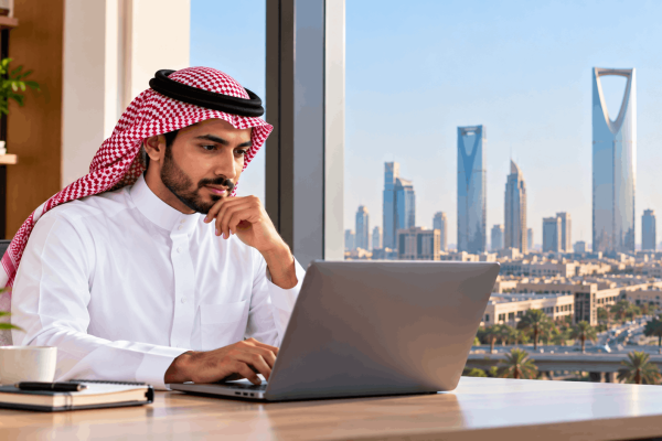 Saudi professional attending live online ISO 14001:2026 Lead Auditor training with the Riyadh skyline in the background